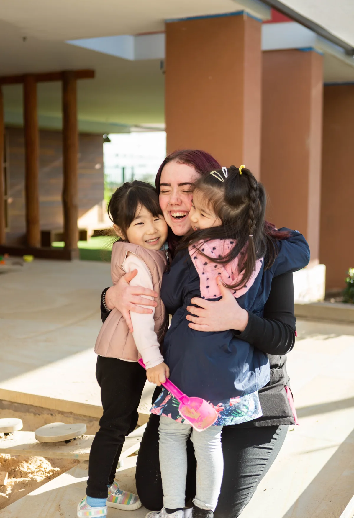 An educator reading to children at Strathfield Early Learning